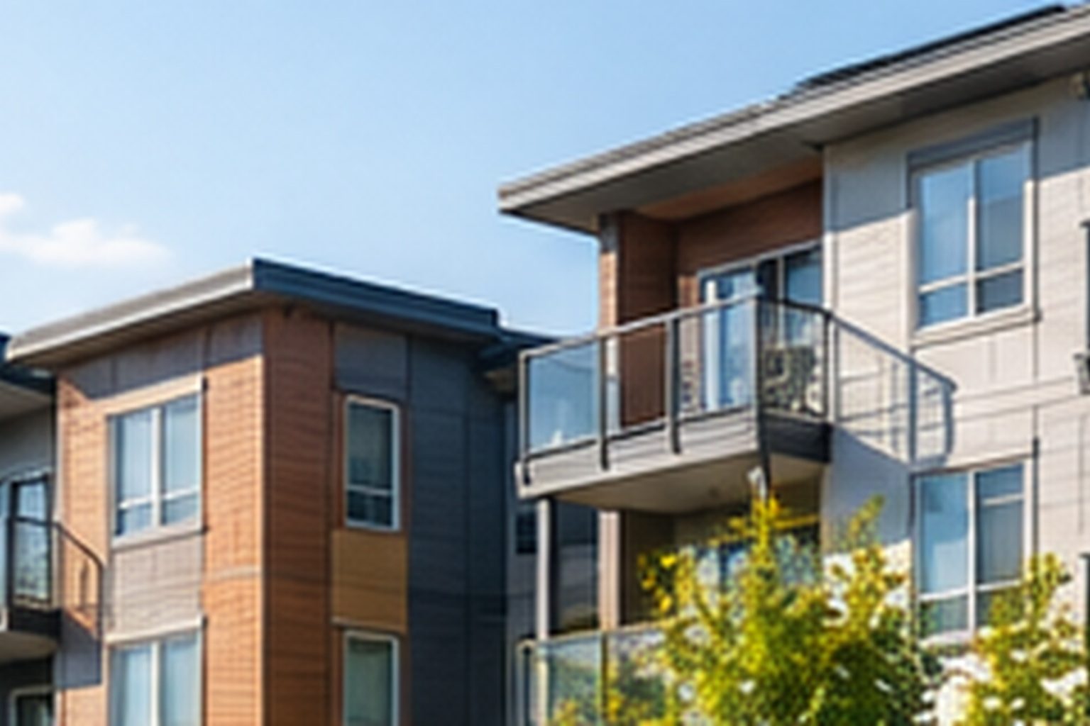 Apartment building with pitched roofs and balconies