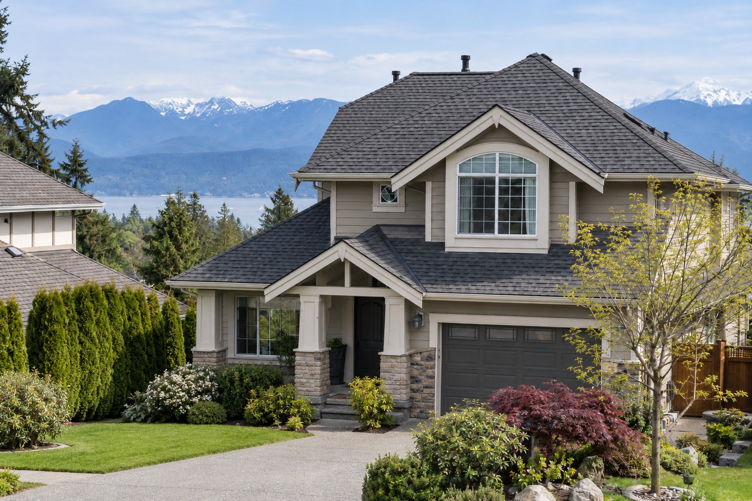Completed asphalt shingle roof on a detached home